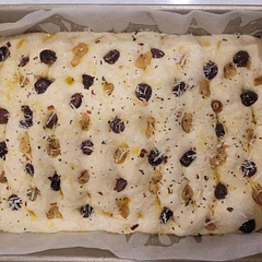 This is pre-bake, topped with roasted garlic, kalamata olive, basil, a few red pepper flakes and a sprinkle of parmesan.  I added 2 or 3 minutes about three times so close to 30 minutes cook time and I feel like still could have been a but darker on top, but good texture and flavor.  Worth the wait.