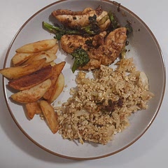 Added some broccoli to the chicken . And made rice for the sides. It was a wholesome meal.