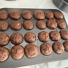 Delicious!  Added 2 tbsp of maple syrup, 2 tbs apple sauce and 2 tbsp cocoa powder.  Made 24 mini muffins and baked for 11 minutes at 350.  Perfect !