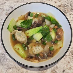 So good and really easy! I added onions and sautéed them with the mushrooms in the sesame oil and soy sauce first. Then added broth, brought to boil and added the bok choy and wontons for the last 2 min. I also added some red pepper flakes. 