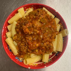 I changed this recipe a bit; I added in some celery, 1/2 tsp of sugar to counteract the tartness and also tomato purée instead of tomato sauce. I accidentally added too many lentils so it wasn’t as saucy as I wanted too. This recipe was for two servings but I have multiple servings to put in my freezer :) this would go so nicely with spaghetti and garlic bread.