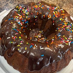 A family favorite! And so easy!! Bake it in a Bundt pan, then it only takes half a can of frosting (I like warming it up in the microwave and drizzling it on) then let the kids add sprinkles. Looks fancy, but with a lot less effort.