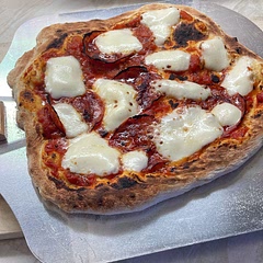 Super easy, nice rise to it. Used a pizza oven for the best results