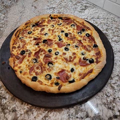 This is my go-to recipe for pizza dough. 
I also like to make the pizza sauce that they suggested on the recipe. 