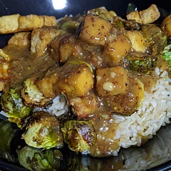 Lovely ☺️ sweet and tart and a little spicy. Crispy tofu with soft brussels. Great combination!