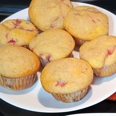 I used 3 eggs and frozen thawed strawberries. I didn't put the extra strawberries or sugar on top because they were SO full. I also ended up with 14 muffins. The muffin itself was delicious and moist. My family is requesting these again. I think they'd also be great with the cherries I froze last year instead of strawberries. 

* The almond flavoring made them delicious with cherries, too!