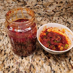 Super fast and easy. Definitely going to use this as a launching point for making my own chili oil in the future. Love the garlic and scallions in this recipe, not too spicy either.