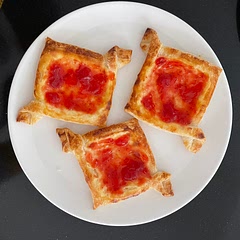 I made it in a typical danish shape as I only had small square puff pastry dough and instead of strawberries I put strawberry jam in the middle but it was delicious!