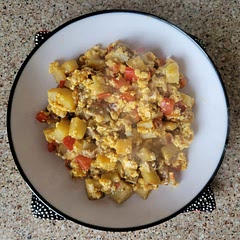 Skipped the onions, garlic, & green bell pepper. used turkey sausage patties (diced), and added cheese & eggs for a scramble. 