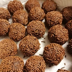 An amazing recipe!! I've done versions with and without rum and they are both super tasty! I rolled some in cocoa powder, but the ones using vermicelli were much better. 