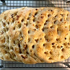 This has been the most delicious and easiest bread recipe I’ve ever made! I will be making this all the time now and can’t wait to experiment with toppings!
Edited to add: I started using Winona Unbleached Unbromated bread flour and it’s seriously the best I’ve ever had. I make this once a week, sometimes twice, and it’s by far my favorite recipe! I love using spicy chili oil as the topping.
