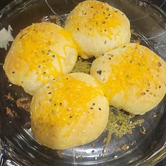 Used Applewood smoked bacon, dehydrated chives, eggs, cheddar cheese inside. Sprinkled everything seasoning on top instead of poppy seeds. Added cheese to the top the last 5 minutes of baking. Husband loved them! 