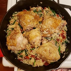 Pretty yummy! The rice is sooo good. I used better than boullion instead of chicken broth, and spinach instead of basil.