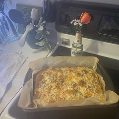 -Maybe add a lil’ bit more flavor/ salt to the dough pre refrigerator
-48 hour rest 
-Maddy dimpled it/ put on the toppings 
-Asiago & Parm *chef’s kiss* 
-Get pit-less olives next time dummy
-Spread dough out more to make thinner
-Ate it with pesto, try it 
marinara or Alfredo next time