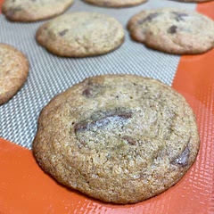 I used 1/4 cup unsweetened applesauce instead of an egg, ditched the white sugar and used 2 tbs date syrup instead, and used 1 cup flour instead. They turned out wow!