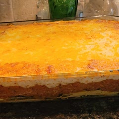 Labor of love for sure. I didn't have percorino or plain parmesan so I used a shredded Italian blend I had on hand and added some type of Colby blend with it on top. Very good. Always reminds me of the opening scenes of My Big Fat Greek Wedding!