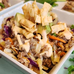 I used fresh pork sausage, which I think totally kicked up the flavor. I also added a few slices of soft avocado on top for extra creaminess. Because, we're not doing Keto I served over rice and added a few wonton crisps. It.was.amazing!!!