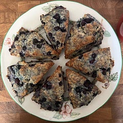 I used an egg substitute, 2 t baking power w/ 1/2 t of baking soda, frozen blueberries, no glaze but brushed with cream. They were fast and fantastic!