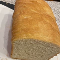 Ended up adding all the flour plus some. My dough never came away from the sides of the mixer, so I kneaded it on a floured counter and it came out perfectly.
