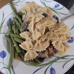 It didn't say how much soy milk to put in,  but in making roughly half the recipe, I added 3/4 C. It's very tasty!