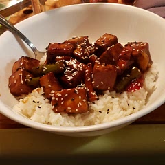 I had never cooked tofu before, but it was so yummy! I added some veggies to the sauce. The Sriracha added a nice amount of heat to create a sweet and spicy sauce.