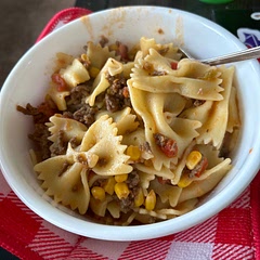 I didn’t use a slow cooker or the shell type pasta but individually cooking the different ingredients and putting them together was still delicious! Can make it as spicy as you want.
