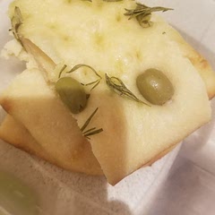 Oiling the rosemary was a good tip! It rose beautifully, just needs longer in the oven at a slightly temperature (for my oven). 