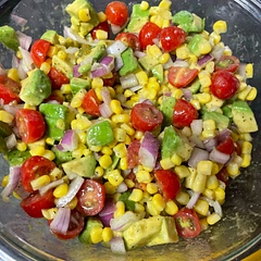 No cilantro, 1.5-2 cups corn - blanched, 2 avocados, 1 sm red onion, way more lime juice and salt and pepper to taste. YUM!