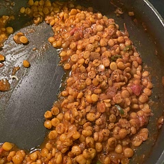 Once you add in the chana, pour 1-2 cups of water, cover with lid and leave until cooked through. Probably takes 30 minutes. Can dry out water after.