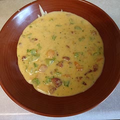 Add bacon and 1/2 teaspoon of cayenne pepper