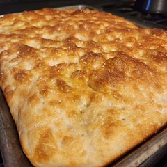 definitely going to be in my weekly routine! so easy, the only difficult part is waiting! crispy on the outside and so soft and pillowy on the inside.l with beautiful air pockets everywhere. perfect for my favorite sandwich! only thing to note (and maybe it's down to my sheet size) but it's not the thick foccacia you can cut in half. makes a great open sandwich though! seriously love this. 