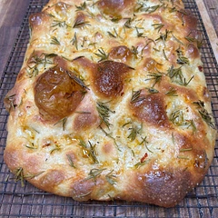 First time baking any kind of bread. Turned out looking like it should I think. 
After cooking I had to pick off all the sundried tomatoes because they burnt. Not sure why? How do you guys do it?
The rest of it looks amazing. Haveing with dinner tonight.