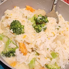 I put mine over rice but make sure you have a big enough pot and pan. I used too small of one and made a bit of a mess. It is filling and really good though! I will make this again! I used frozen broccoli and carrots for mine and it came out great!