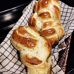 My first attempt at making bread. It was perfect. I don't love the taste of yeast, so I liked the bread best after it cooled. 