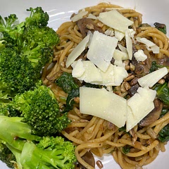 Loved this. The lime added a great smell and brightened the flavor. I added both nutritional yeast and Parmesan cheese while substituting the pine nuts for sunflower seeds. Kinda measured everything with my heart as well which turned out great.