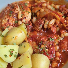 As others have said, add paprika, chilli flakes and anything else you fancy. Also half the amount of water the recipe states.