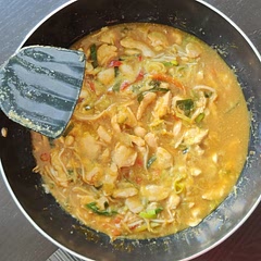 I added some precut wok veggie mix. It's not as orange as I thought it would be, but it's very tasty.