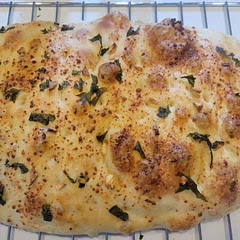 I have never made bread before and this was pretty easy. Used garlic, fresh basil, grated parmesan and sea salt as toppers. Delicious! 