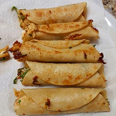 Great dinner! I would rate it a 9 out of 10. We fried them in vegetable oil and they came out nice and crispy. I'm sure they would have been less calories if we baked them in the oven but it's hard to beat the taste of fried taquitos. As one of the prev posts mentioned - frying does make a mess of the kitchen!