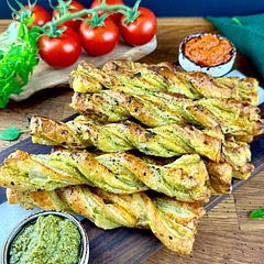 Notes:
You can customise the recipe by using different types of pesto or adding other ingredients like cheese or olives.
The twisting of the pastry strips adds an attractive visual appeal to the final result.
These twists are great for parties, potlucks, or as a tasty addition to a picnic or packed lunch. They are easy to transport and can be enjoyed both warm and at room temperature.