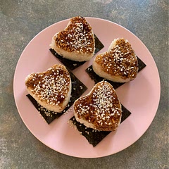 success! the first time I tried those they kept falling apart, but ever since I got an onigiri press and it's making me very happy :)