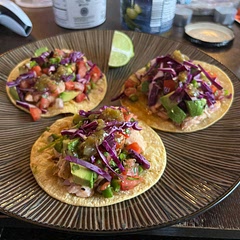 Tasty! We made a quick pico de gallo with tomato, onion, cilantro, and lime juice and used red cabbage instead of romaine lettuce. Also baked the salmon rather than pan frying it, so it wasn’t technically “blackened” but the spice mix was very good.
