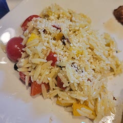 This was a nice summery side dish that was a change from the norm. I felt like it did need the cheese that is indicated as optional. I didn't have any feta but used parmesan and that perked it up. 