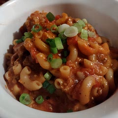 Healthier, tastier and more cost effective than hamburger helper. I halved the recipe except for the tomatoes, and it still made 3 servings. May be too salty for some. Leave out salt until after cooking. 10/10