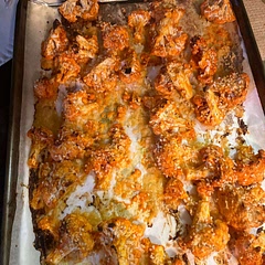 Hubby added a small amount of panko and grated cheese before baking. Yummy