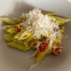 added some cherry tomatoes and pinion nuts! very tasty topped with parmesan cheese.