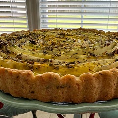 This was delicious! I will definitely make it again. We added Parmesan and herbs to the crust, and minced garlic to the ricotta. It was fun but time consuming to make it pretty.