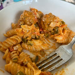 I added diced onion and green bell peppers. I’m a garlic girl so I added a little more garlic. And added Turkey meatballs, definitely hit with our fam!