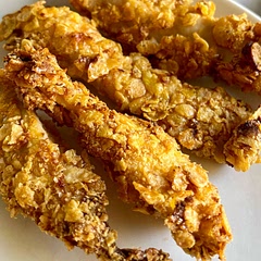 It’s healthy and so easy to make. To make sure the cornflakes stay intact, make sure you break them fine enough to stick but not too fine making the chicken soggy, and make sure to press the chicken hard to make it stick to the flakes.