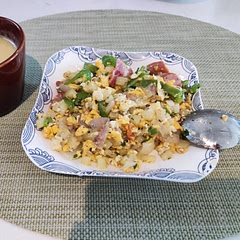 Scrambled the eggs, added some Italian spices and sausages.